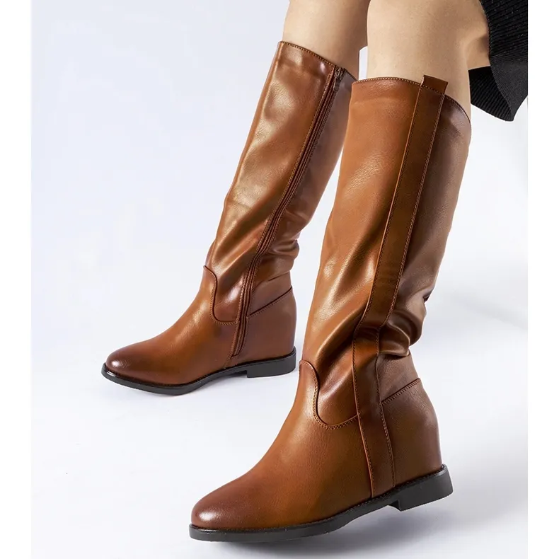 Brown boots with hidden wedges from Chieuti