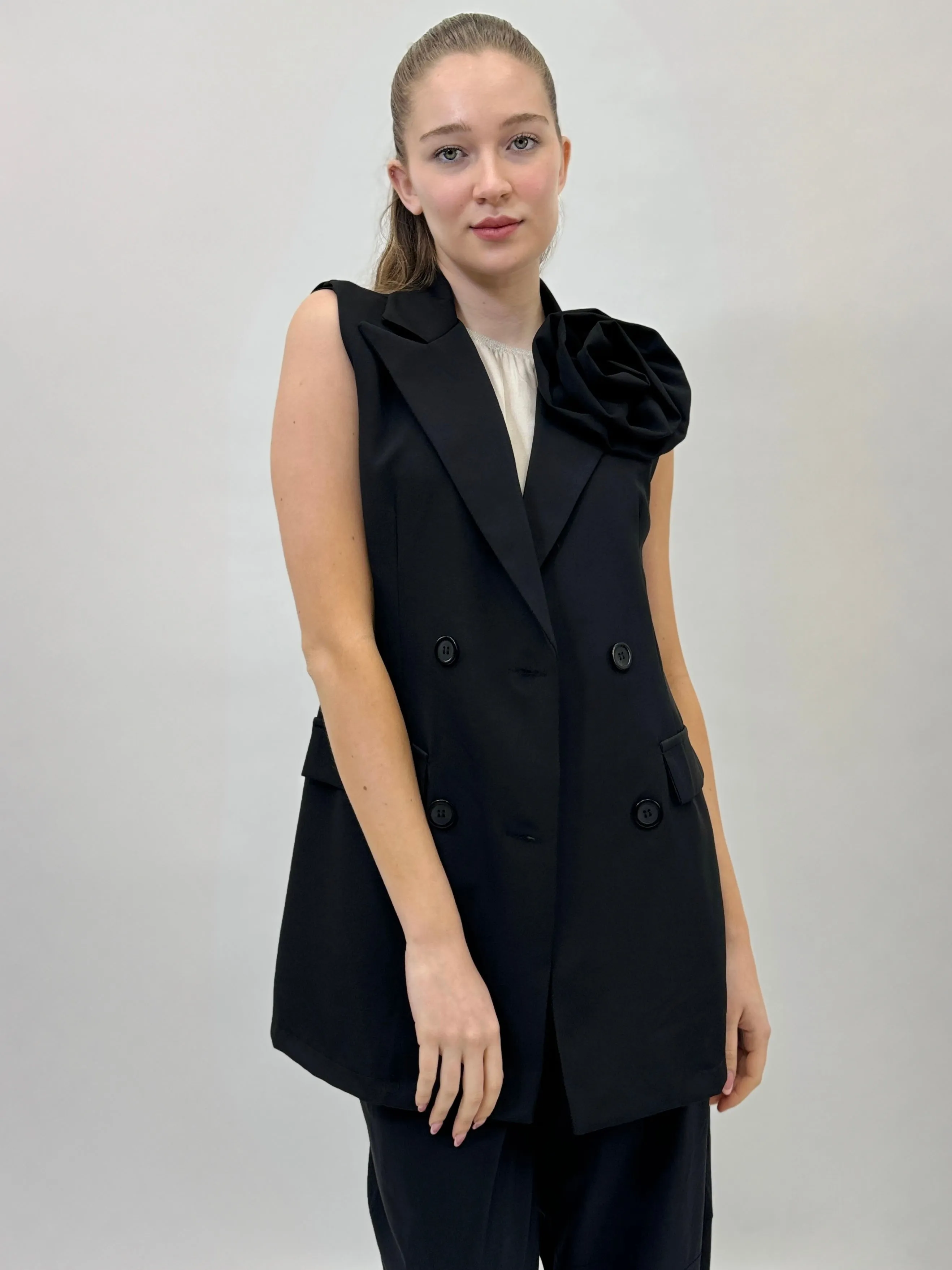 Gilet con dettaglio rosa