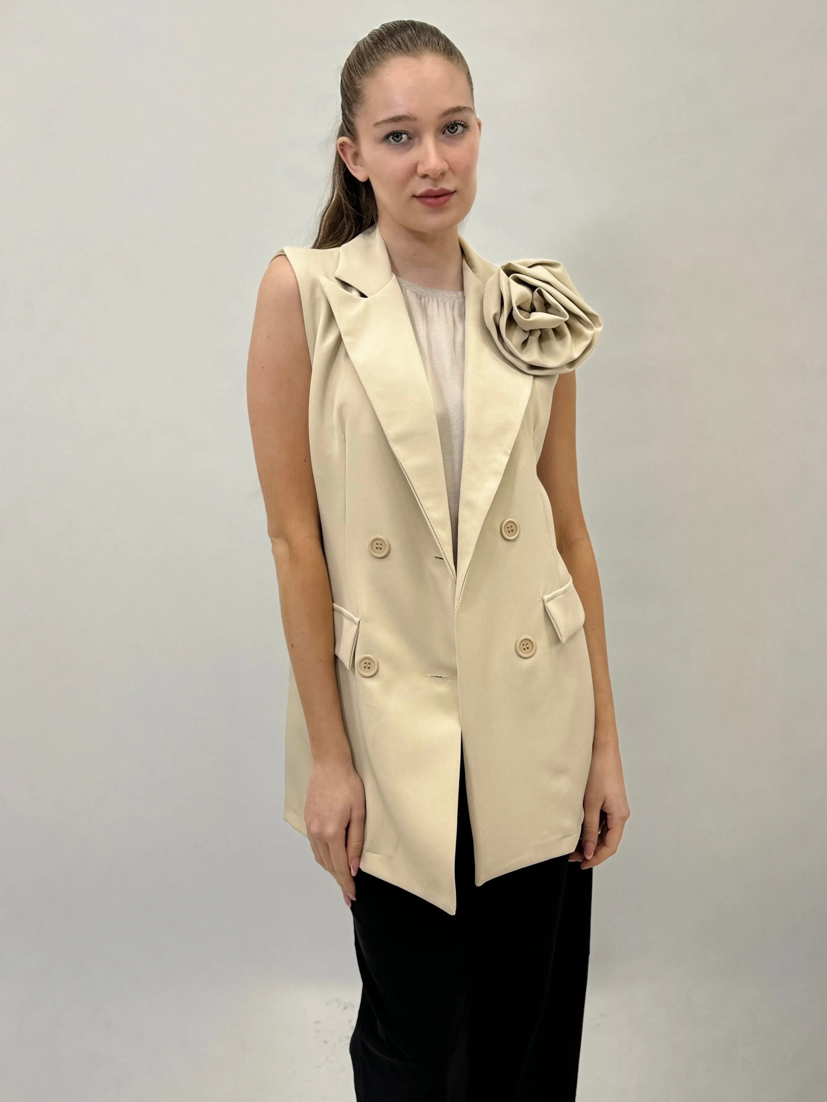 Gilet con dettaglio rosa