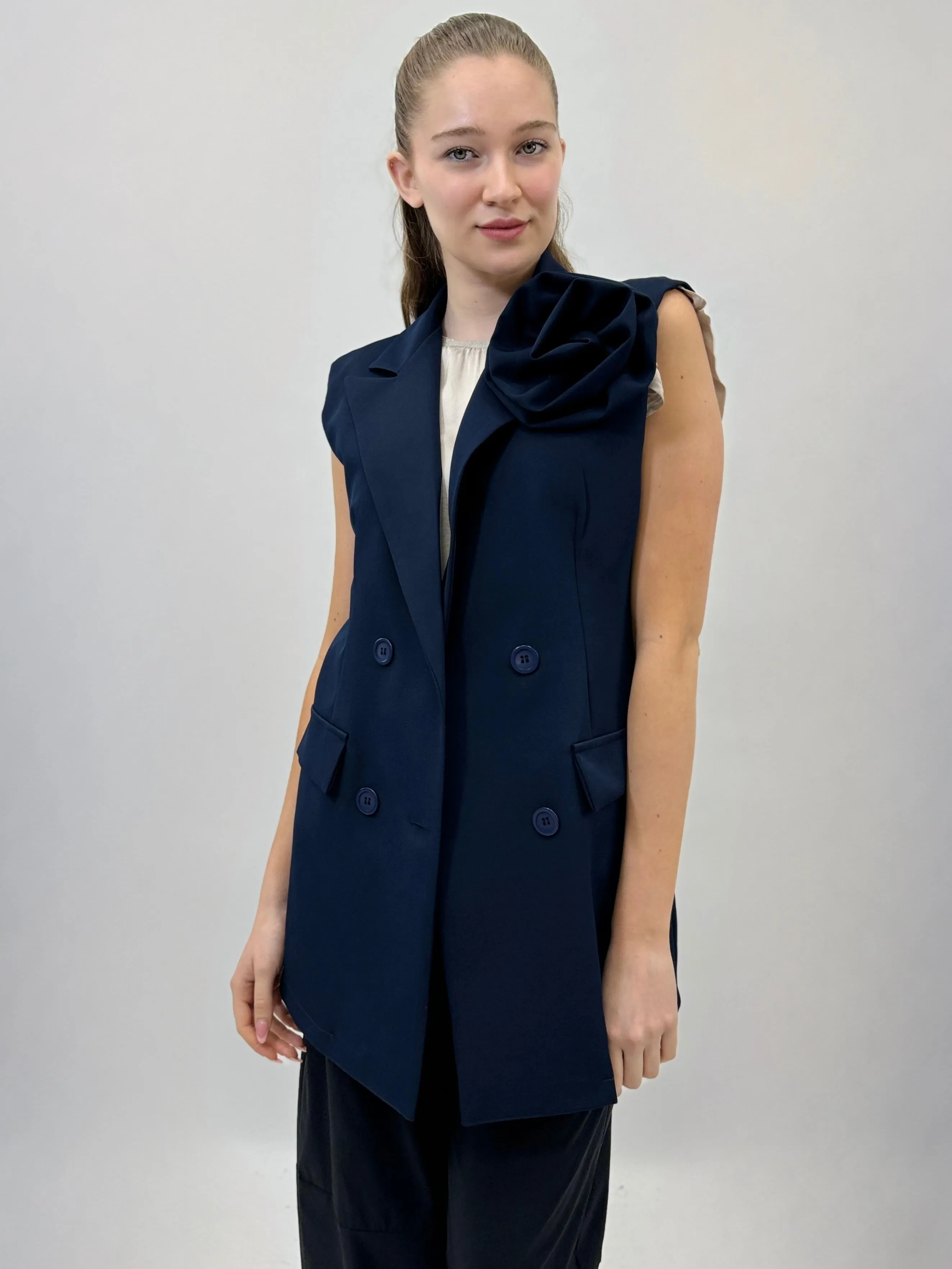 Gilet con dettaglio rosa