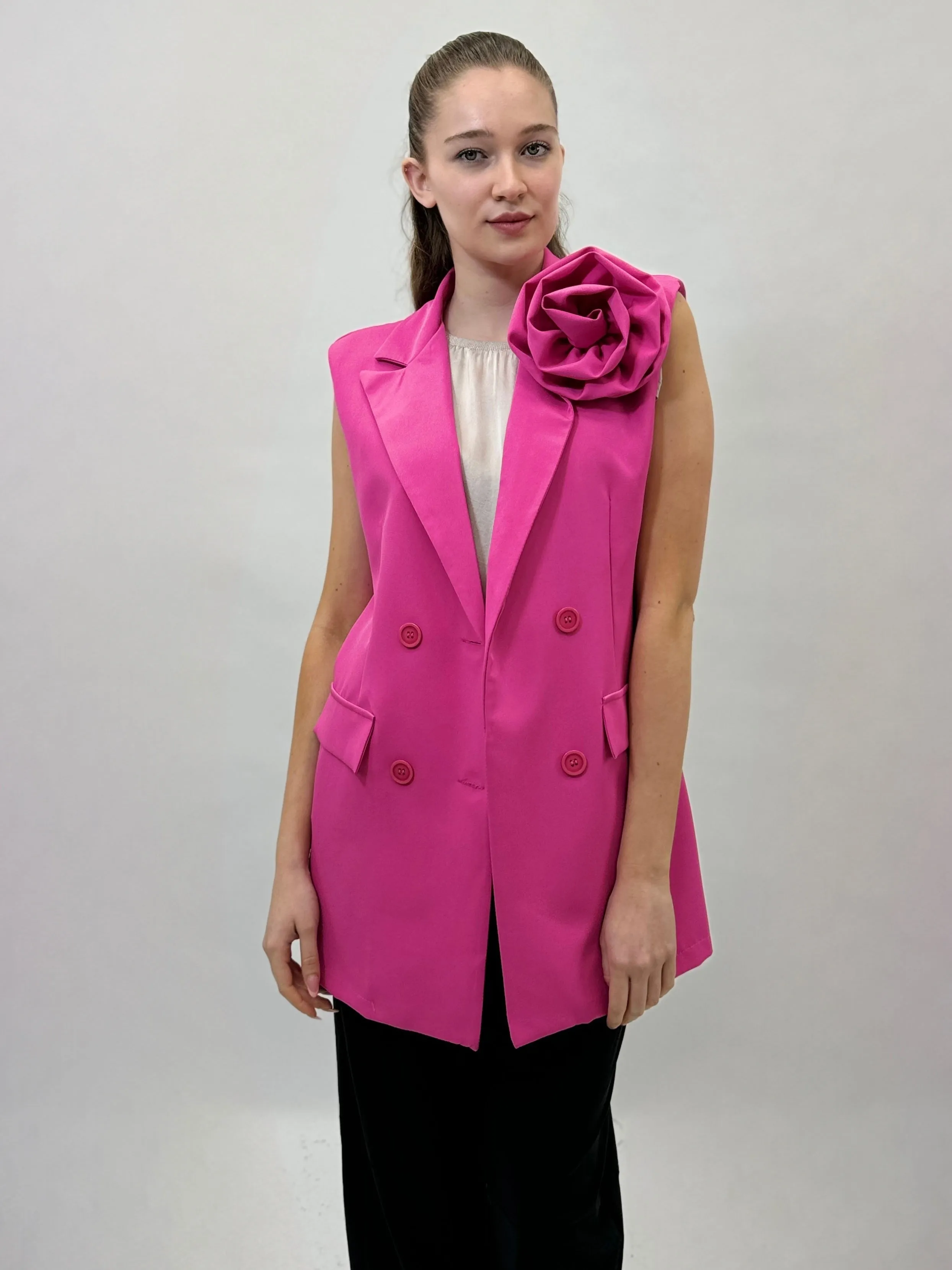 Gilet con dettaglio rosa