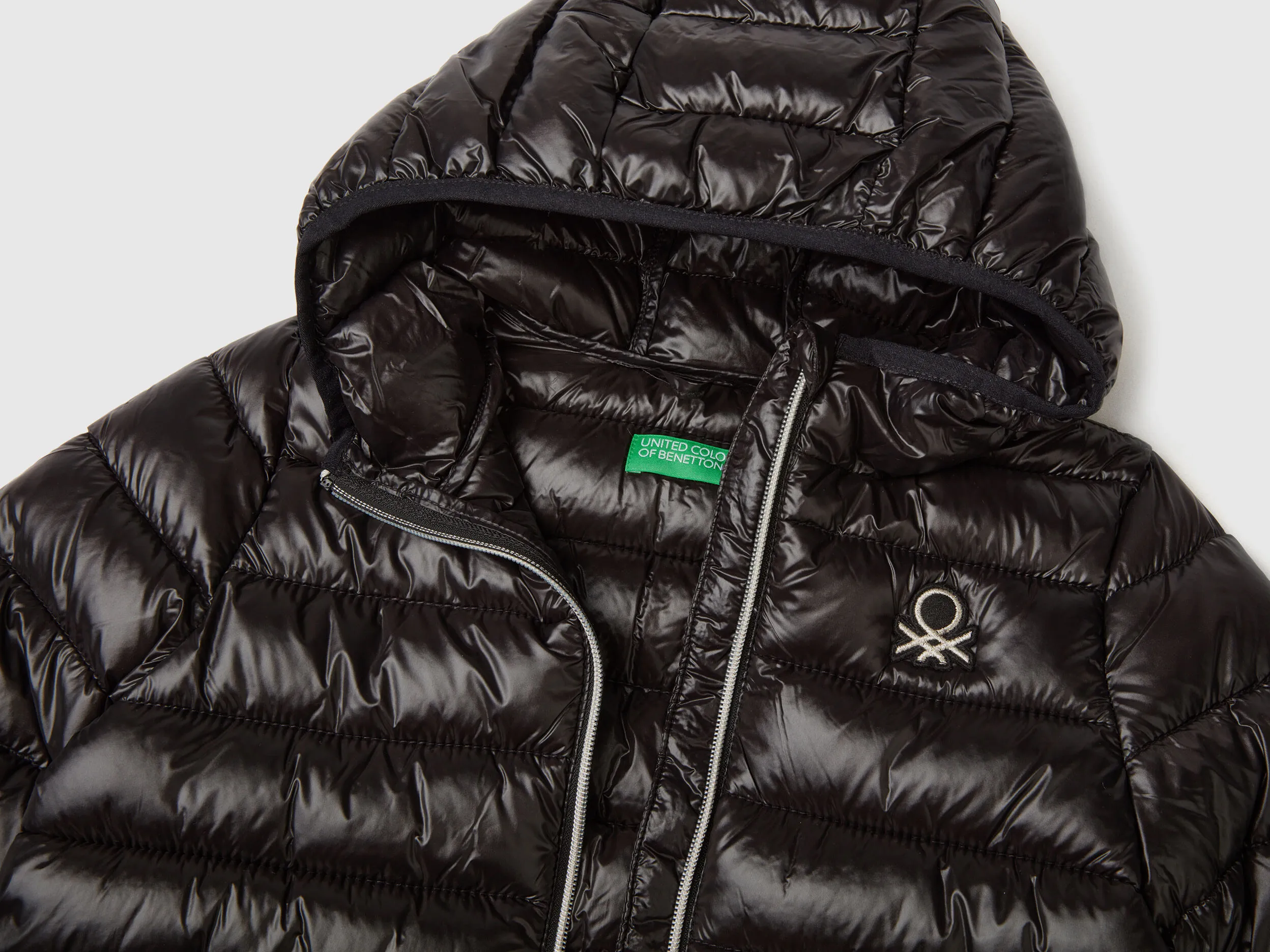 Puffer jacket with hood - Black | Benetton